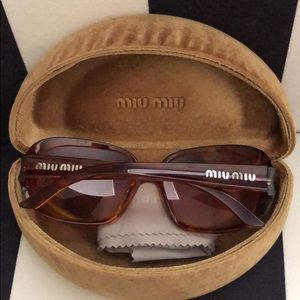 Miu Miu sunglasses 🕶 with green velvet case.